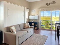 Building Photo - Make this charming studio with marsh views...