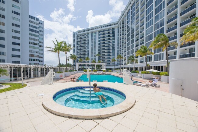 Building Photo - 10275 Collins Ave