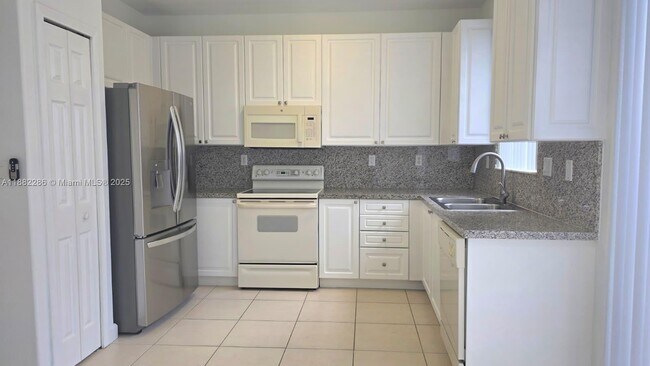 Building Photo - 5570 NW 107th Ave