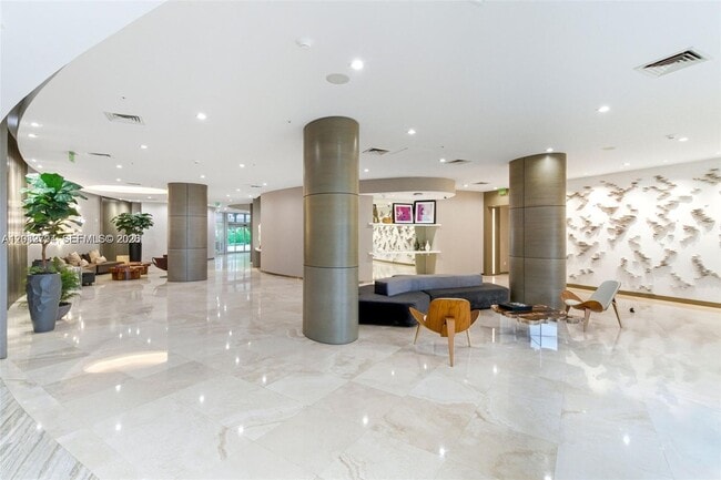 Building Photo - 10275 Collins Ave