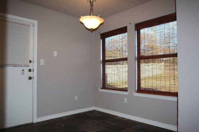 Building Photo - Cozy 3/2 Burleson Charmer | Wood-Burning Fireplace | 2-Car Garage | Pet-Friendly
