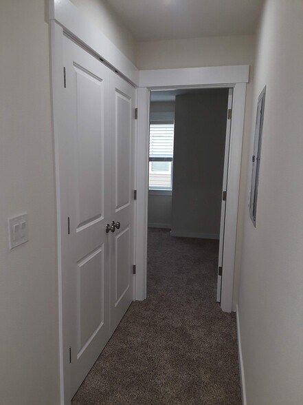 Laundry closet on the left - 8814 N Edison St