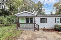 Building Photo - Two Bedroom Duplex Great Features and Comfortable Living!