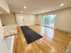 Building Photo - Stylish Corner Unit in Prime Needham Locat...
