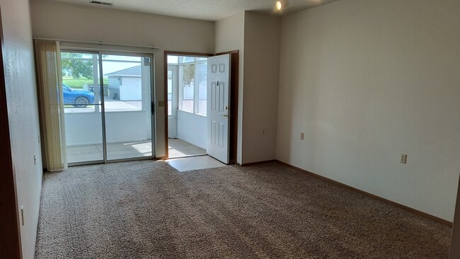 Living Room & Three-Season Porch - 251 6th St