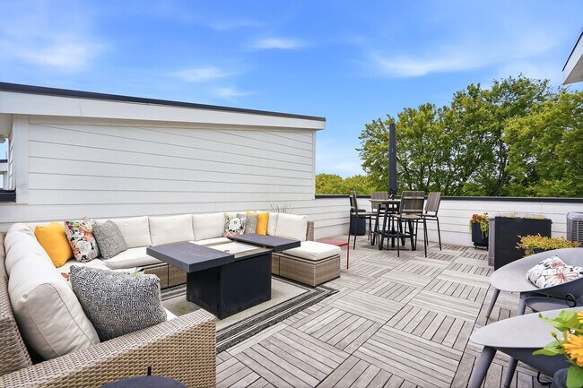 Building Photo - Live Elevated in Downtown Raleigh – Stunning Townhome with Rooftop Oasis!