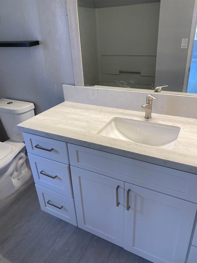 Building Photo - 7565 Charmant Dr