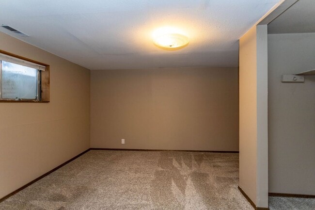 Building Photo - Comfortable Ranch-Style Living with Large Fenced Backyard!