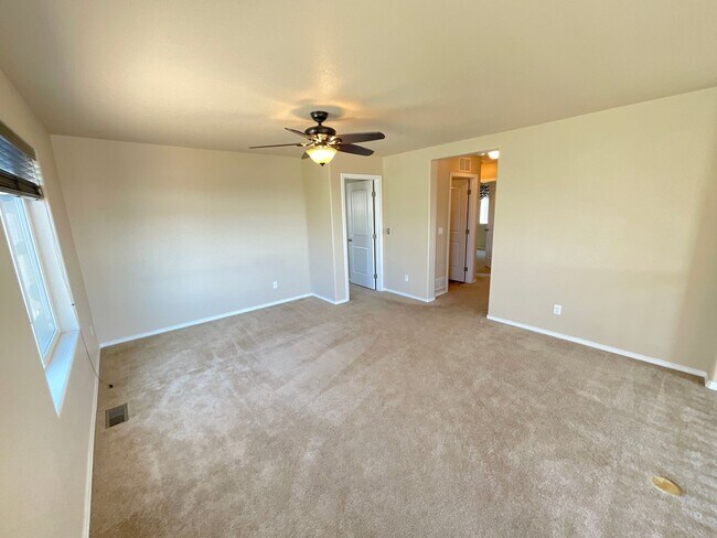 Building Photo - 4 Bedroom Home Available Near Voyager Pkwy...