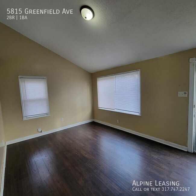 Building Photo - with back deck & garage/workshop combo (ha...