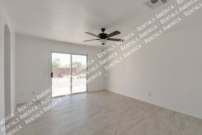Building Photo - 5573 W Dove of Peace Dr