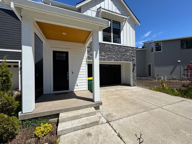 Building Photo - Modern and Immaculate 4-Bedroom Bethany Home with Designer Finishes and Fenced Yard