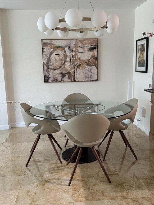 Building Photo - 10275 Collins Ave