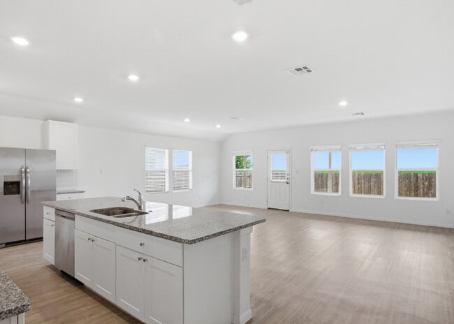 Building Photo - 4 Bedroom Home with Open Layout and Refrigerator Included