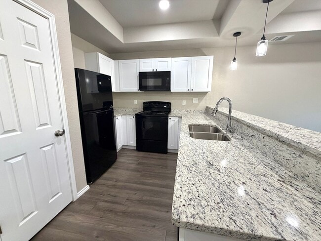 Building Photo - Modern 3BR Townhome w/ Garage, Private Yard & No Carpet – Built 2022