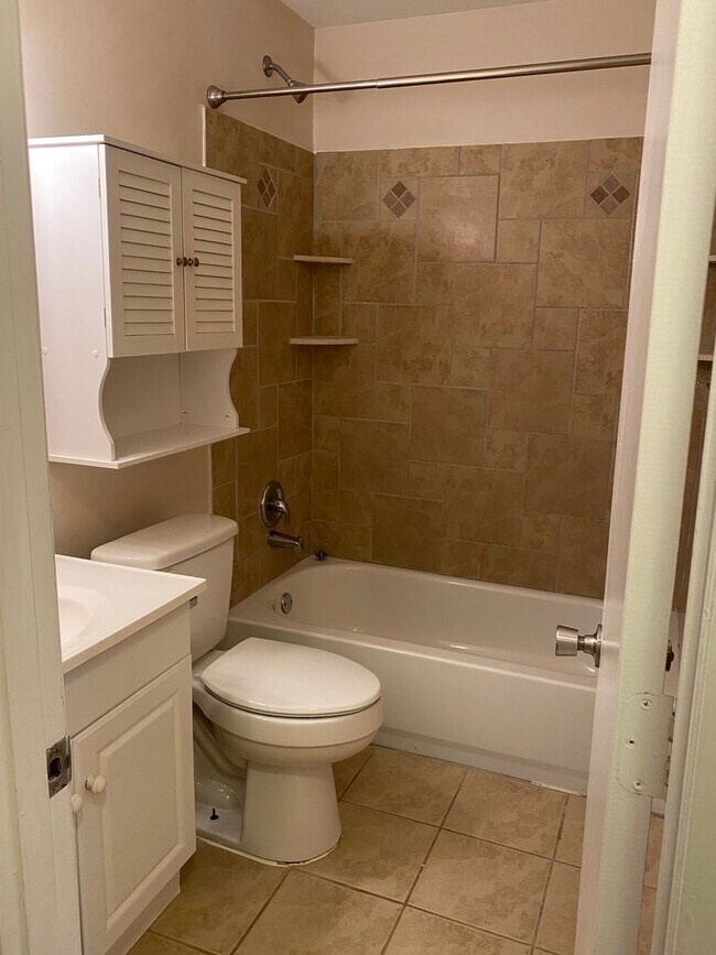 Building Photo - COMING SOON! 4Br, 2.5 baths, large kitchen, large bedrooms, fence, storage and more! N. College R...