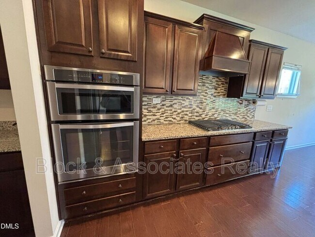 Building Photo - 1009 Magnolia Blossom Ln