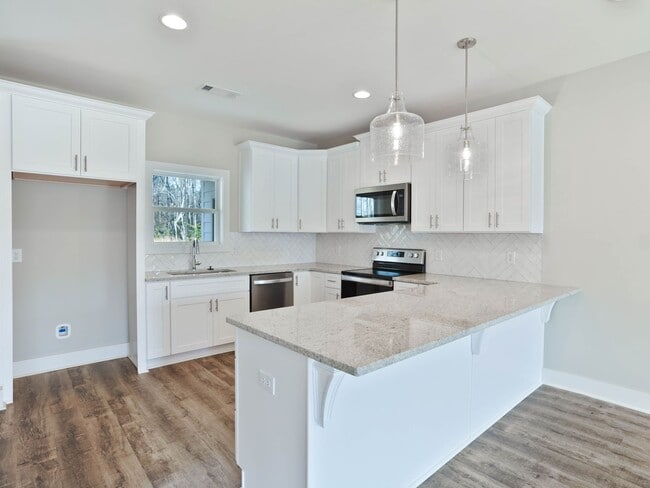 Building Photo - Charming Two-Level Home in The Village - COMING SOON!