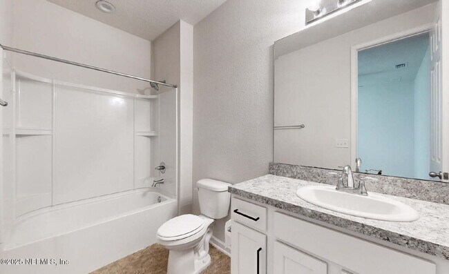 Building Photo - FOR RENT: 3BR 3BA SINGLE FAMILY HOUSE - Modern Greyhawk Retreat with Pond Views, Flex Space & Res...