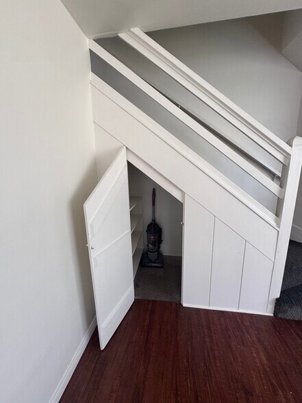 Under the stairs storage closet. - 424 W Riggin St