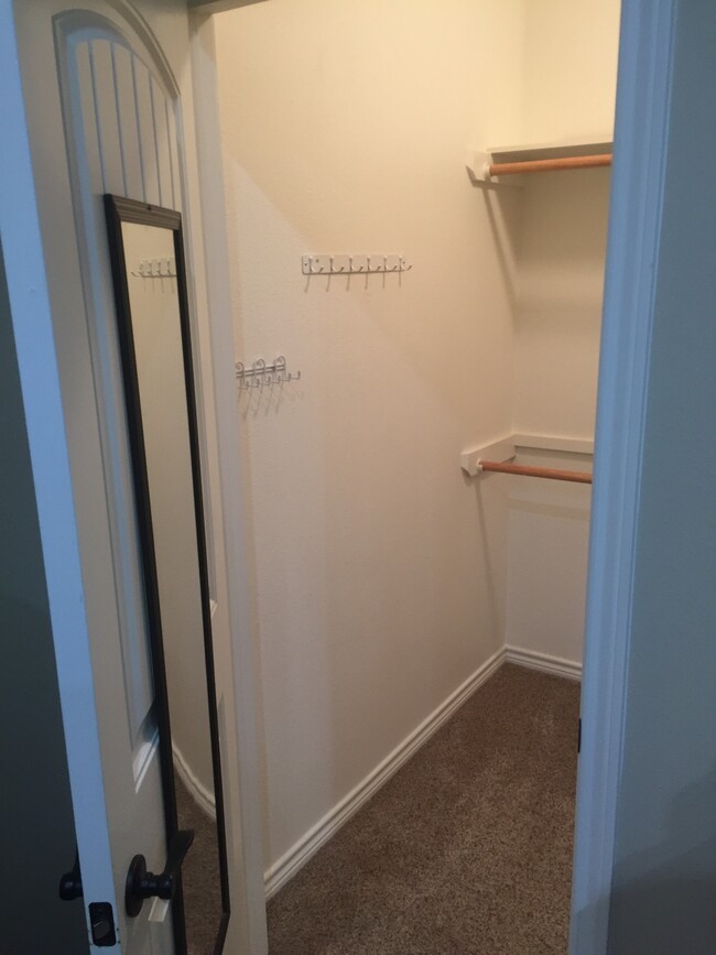 One of two master bedroom closets - 500 Longhorn Dr