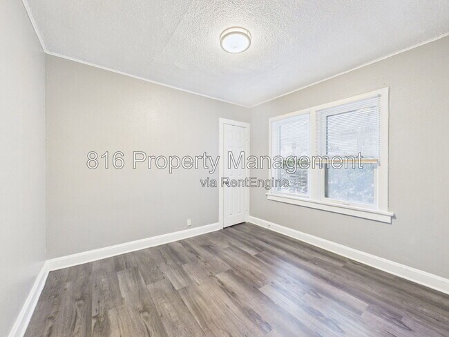 Building Photo - 6808 S Benton Ave