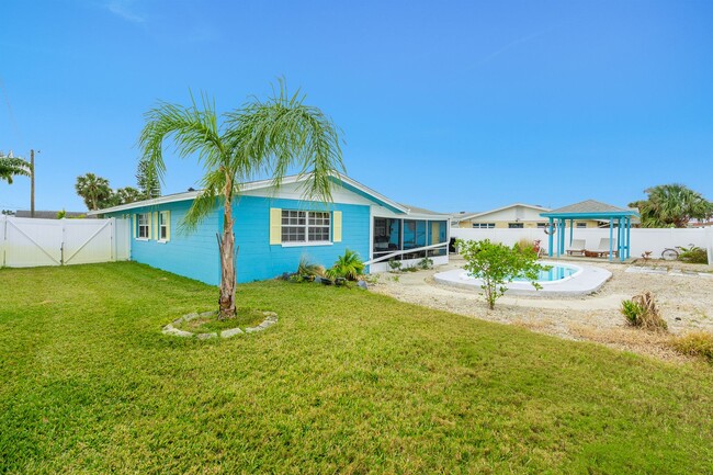 Building Photo - Furnished Home with Backyard Oasis