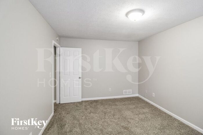 Building Photo - 634 Woodsong Ln