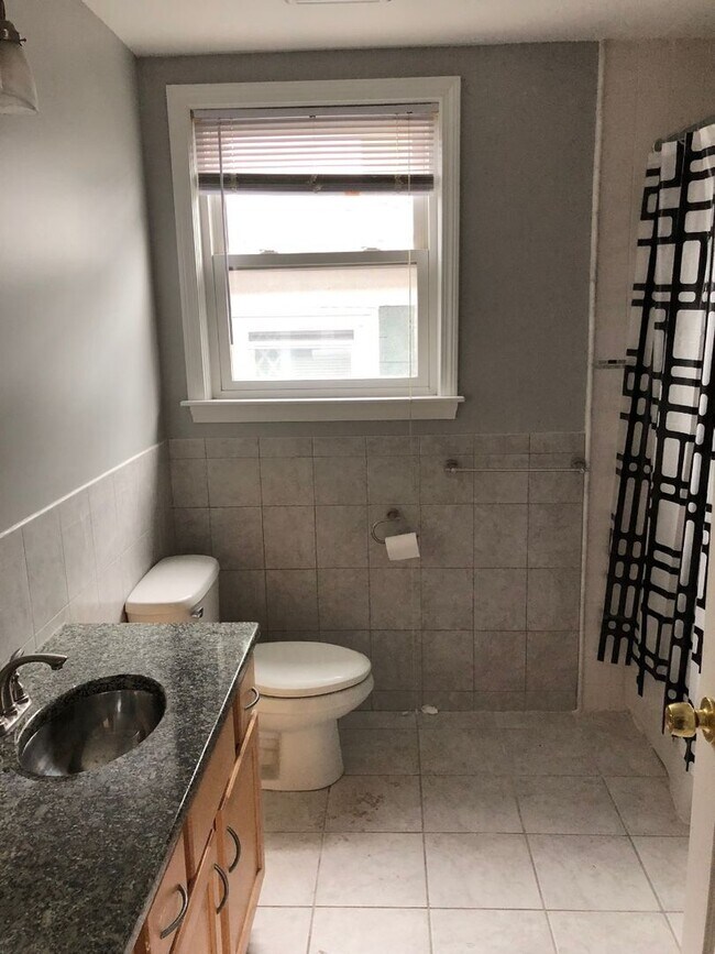 Building Photo - 4Br/2Bth, Great location, close to Wentwoth, Orange Line, Laundry in UNIT!