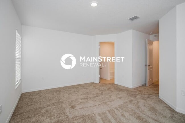 Building Photo - 4 Bedroom Pet-Friendly Home in Mascotte, FL with Main Street Renewal