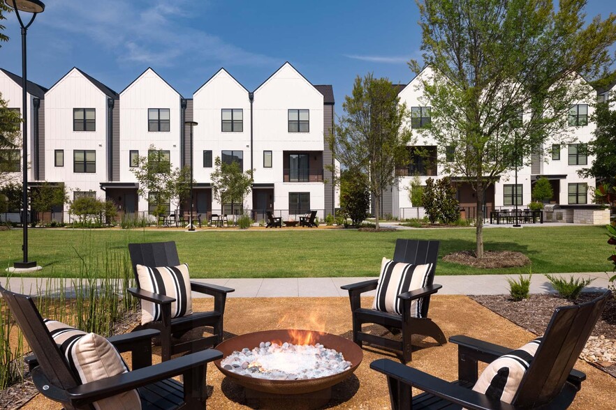 Gather around the fire pit for cozy evenings under the stars with friends and neighbors. - Windsor West Plano