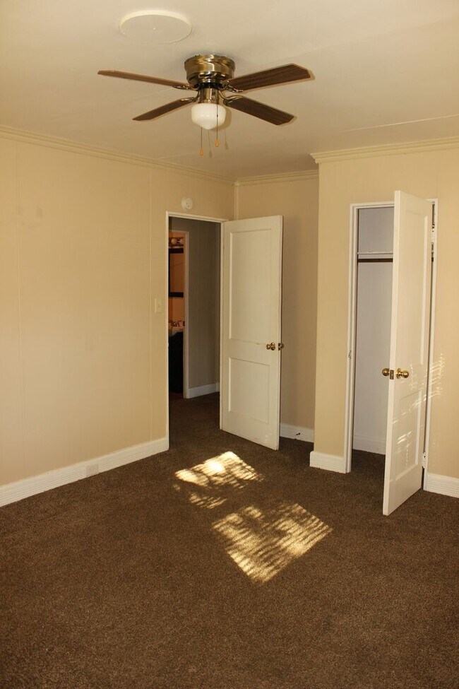 Building Photo - PRELEASING for AUGUST! Walk to Ball State! Spacious 4BR with Fenced Yard & Garage