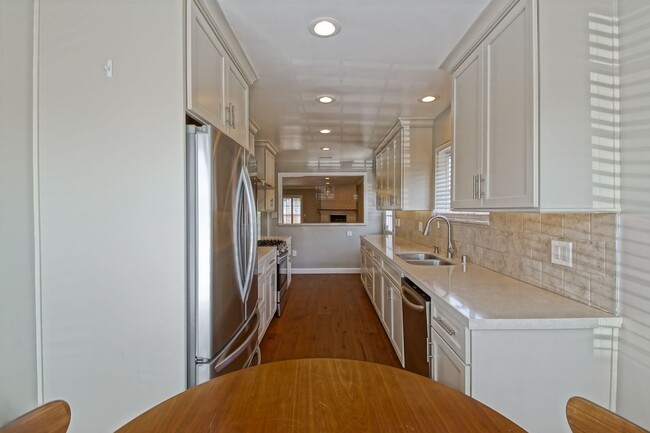 Building Photo - REMODELED, BRIGHT & AIRY, 4BR3BA HOME W/ G...