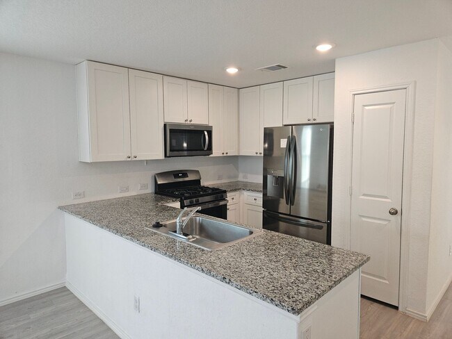 Building Photo - 4 Bedroom with 2 car garage