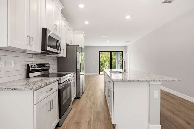 Building Photo - Brand New 4-Bedroom Gem with 2 Full Baths A Magical Space For Your Family!