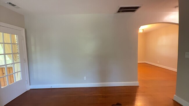 Building Photo - Charming 2BR with Sunroom, Hardwood Floors & Lawn Care Included