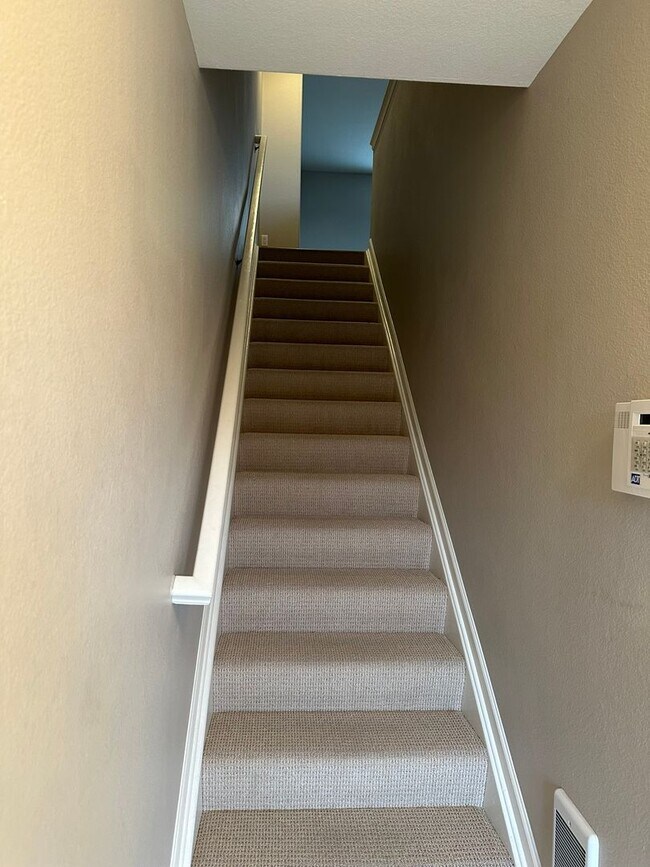Building Photo - Large garage with attached spacious 2 bedroom townhome