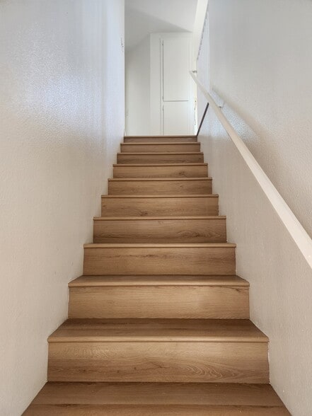 Stairs up to Main Living - 625 S Osage Ave