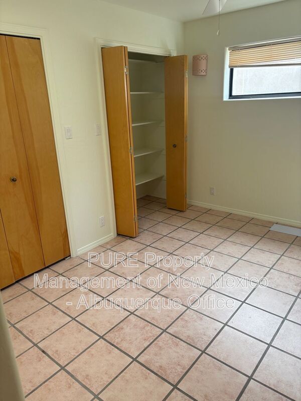 Building Photo - 8220 W Raintree Dr NE