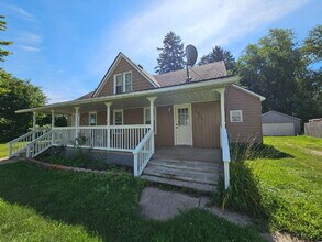 Building Photo - Duplex - 2 Bedroom, 2 Full Bathrooms and a 2 Car Garage. Updated Living Space with Hardwood Floor...