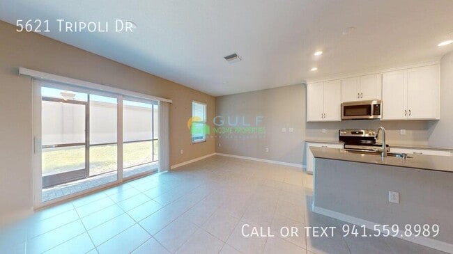 Building Photo - 5621 Tripoli Dr