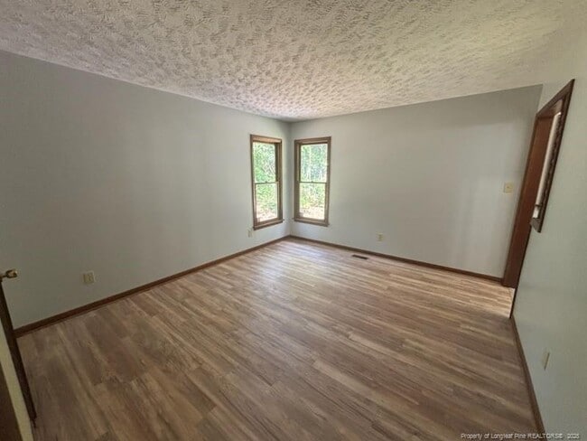 Building Photo - 5590 Bellflower St