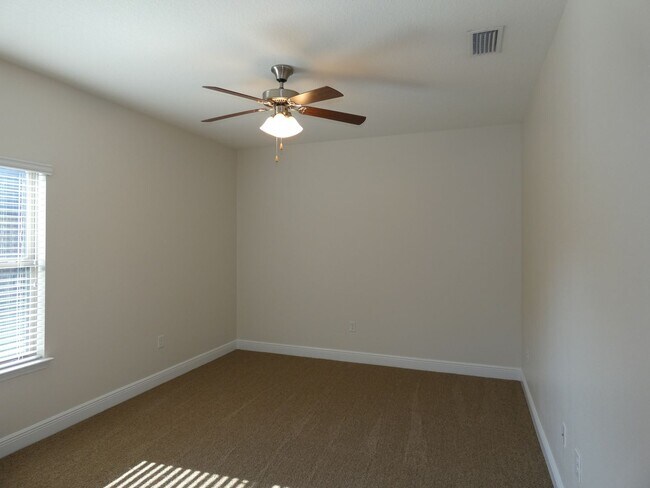 Building Photo - Spacious 5-Bedroom Home - Heart of Pace