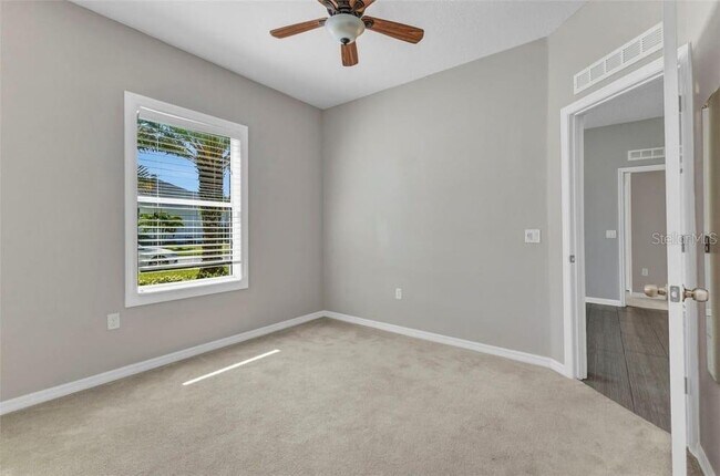 Building Photo - 2640 Suncoast Lakes Blvd