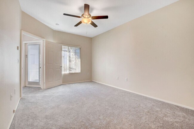 Building Photo - FIRST FLOOR CONDO IN GATED COMMUNITY W/ SINGLE CAR GARAGE