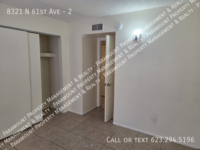 Building Photo - 8321 N 61st Ave