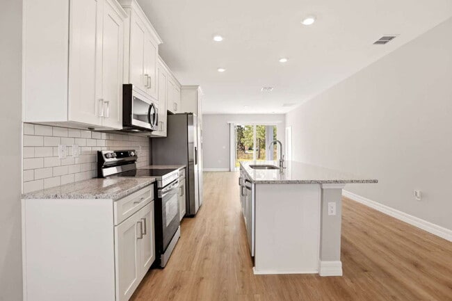 Building Photo - Brand New 4-Bedroom Gem with 2 Full Baths on Large Lot in Lehigh Acres – A Perfect Family Haven!