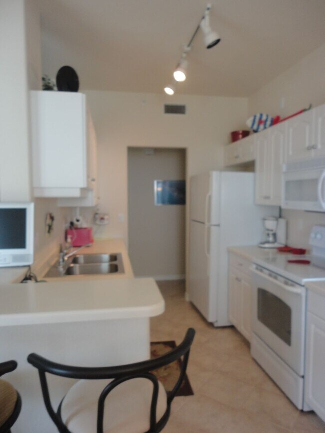 Building Photo - NEW PRICE! Venice Island 3BR/2BA 3rd Floor End Unit Condo