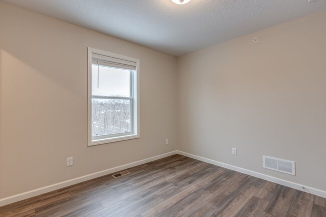 Building Photo - Newer Construction for RENT 3bd 3ba 2 car attached garage END UNIT available Jan 2026