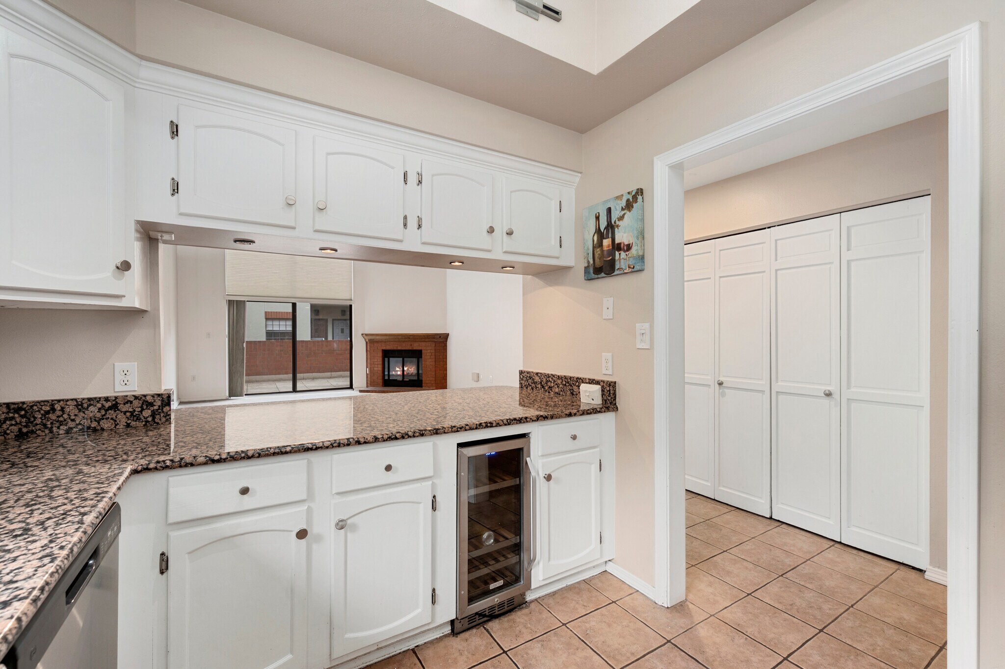 The kitchen with everything, even a beverage fridge! - 1512 Larimer St